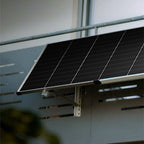 Solar panel mounted on a balcony railing with a Hoymiles HiFlow Pro microinverter