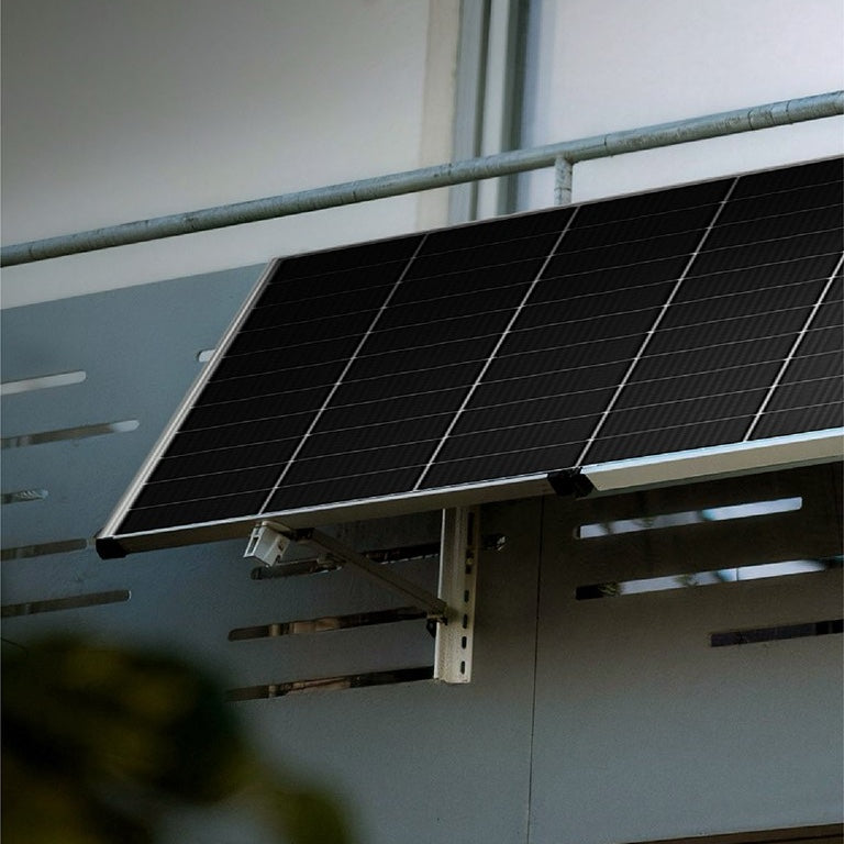 Solar panel mounted on a balcony railing with a Hoymiles HiFlow Pro microinverter